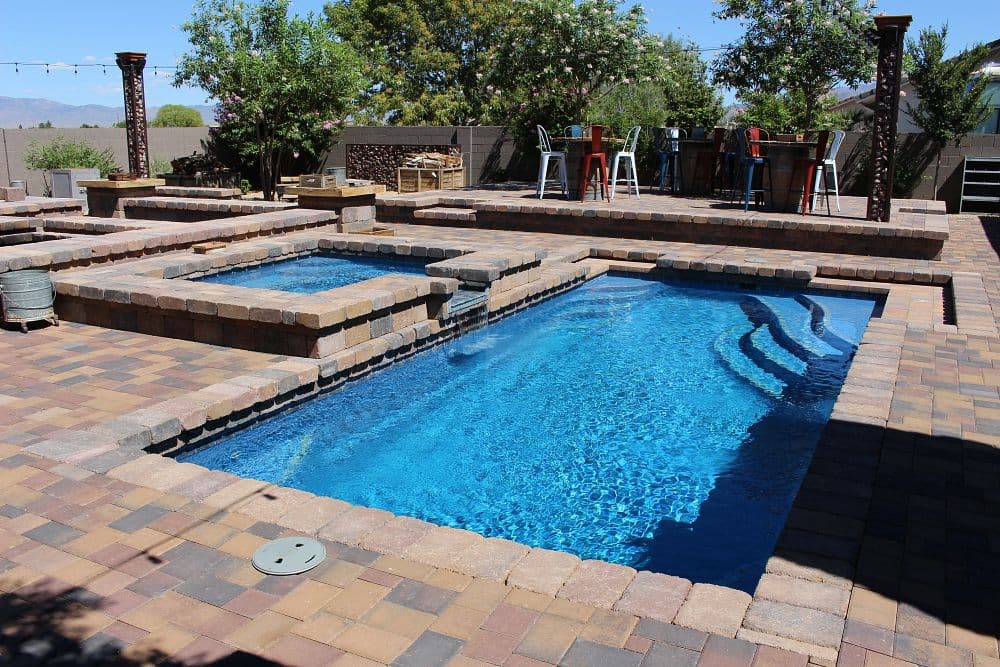 Cleaned pool deck with sparkling blue water in Phoenix, AZ" 2